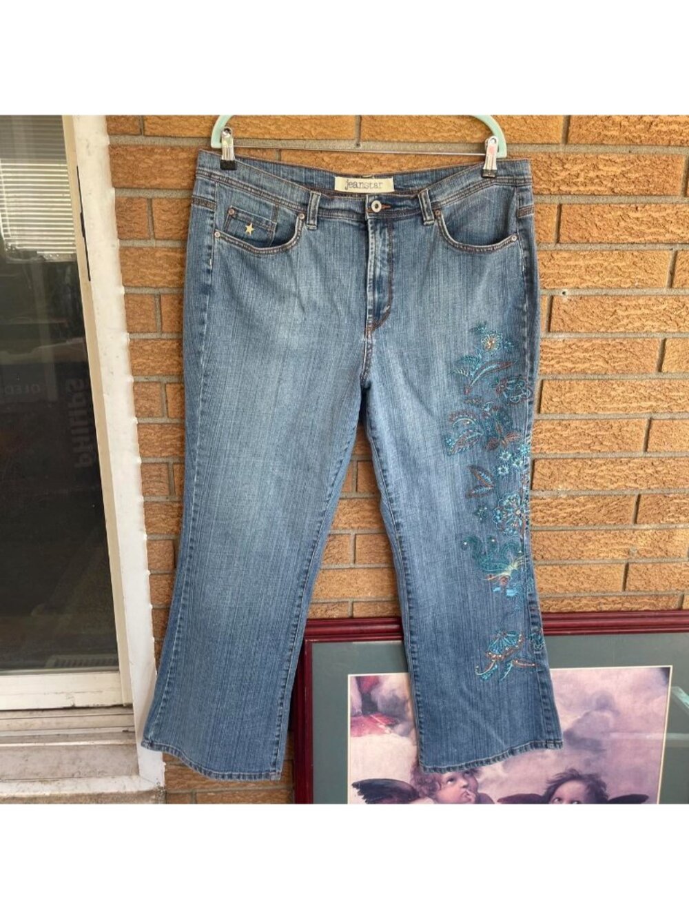 Y2K Jeanstar bootcut jeans with blue floral embroidery